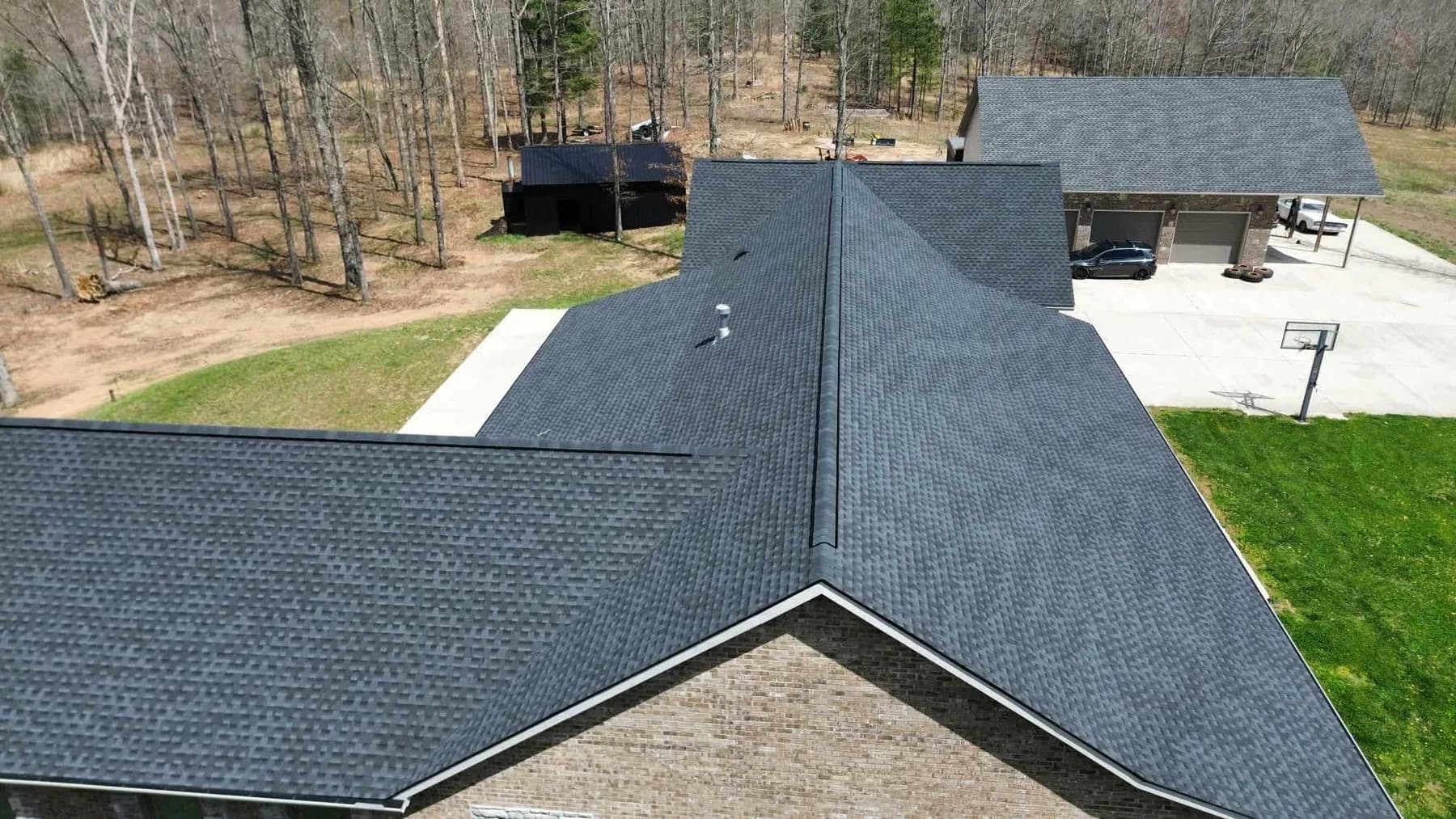 Close aerial detail of roof planes and ridge work